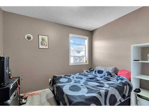 108 Tuscany Springs Gardens Nw, Calgary, AB - Indoor Photo Showing Bedroom