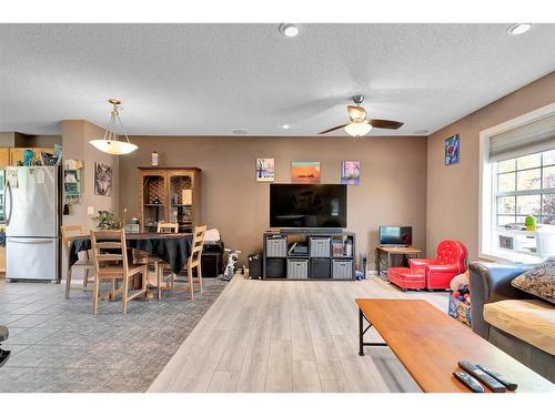 108 Tuscany Springs Gardens Nw, Calgary, AB - Indoor Photo Showing Living Room