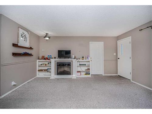 1306 1St Avenue, Canmore, AB - Indoor With Fireplace