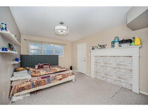 1306 1St Avenue, Canmore, AB - Indoor Photo Showing Bedroom