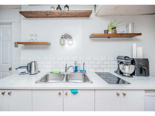 1306 1St Avenue, Canmore, AB - Indoor Photo Showing Kitchen With Double Sink