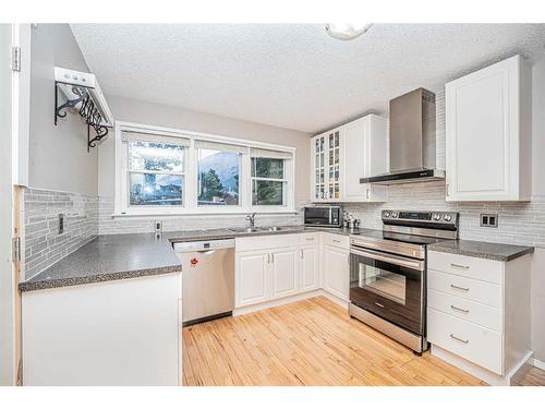 1306 1St Avenue, Canmore, AB - Indoor Photo Showing Kitchen With Double Sink