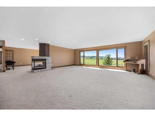 42053 Township Road 252, Rural Rocky View County, AB - Indoor With Fireplace