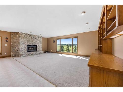 42053 Township Road 252, Rural Rocky View County, AB - Indoor Photo Showing Other Room With Fireplace