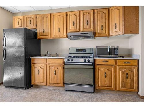 42053 Township Road 252, Rural Rocky View County, AB - Indoor Photo Showing Kitchen