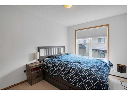 205-3 Somervale View Sw, Calgary, AB - Indoor Photo Showing Bedroom