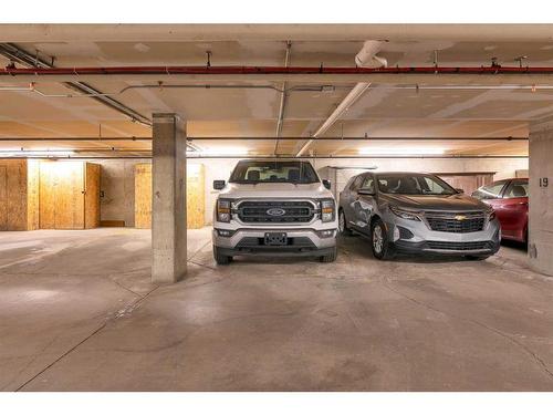 205-3 Somervale View Sw, Calgary, AB - Indoor Photo Showing Garage