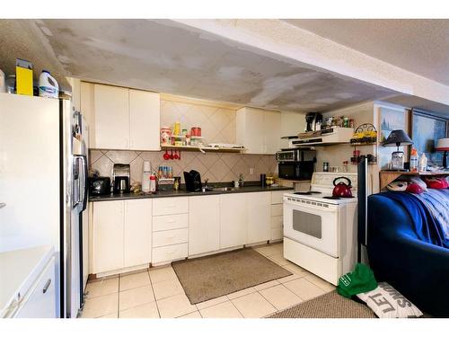 2412 43 Street Se, Calgary, AB - Indoor Photo Showing Kitchen With Double Sink