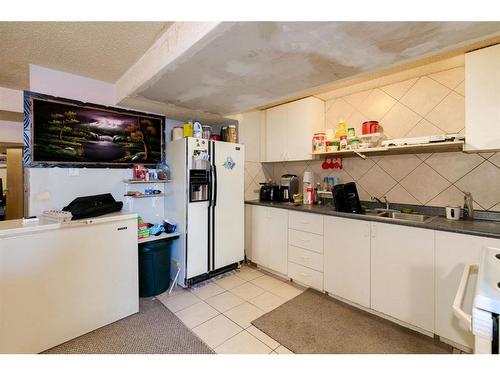 2412 43 Street Se, Calgary, AB - Indoor Photo Showing Kitchen With Double Sink