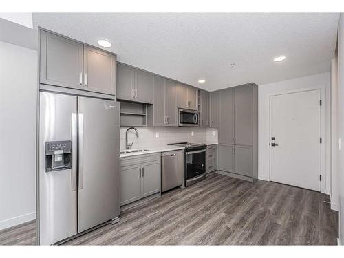 2305-350 Livingston Common Ne, Calgary, AB - Indoor Photo Showing Kitchen With Stainless Steel Kitchen