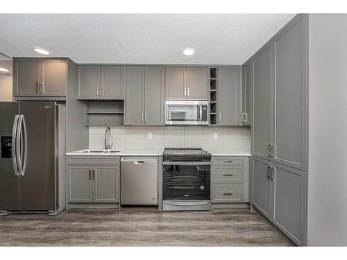 2305-350 Livingston Common Ne, Calgary, AB - Indoor Photo Showing Kitchen With Stainless Steel Kitchen