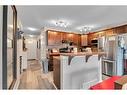 148 Chaparral Valley Gardens Se, Calgary, AB  - Indoor Photo Showing Kitchen With Stainless Steel Kitchen 