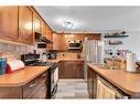 148 Chaparral Valley Gardens Se, Calgary, AB  - Indoor Photo Showing Kitchen With Double Sink 