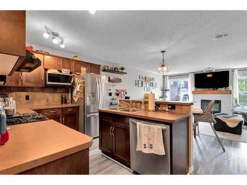 148 Chaparral Valley Gardens Se, Calgary, AB - Indoor Photo Showing Kitchen With Double Sink