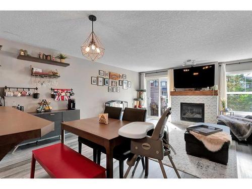 148 Chaparral Valley Gardens Se, Calgary, AB - Indoor With Fireplace