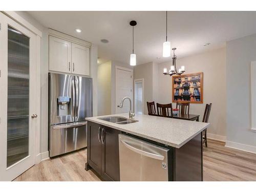 710 23 Avenue Nw, Calgary, AB - Indoor Photo Showing Kitchen With Stainless Steel Kitchen With Double Sink With Upgraded Kitchen