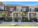 611 Cranbrook Walk Se, Calgary, AB  - Outdoor With Balcony With Facade 