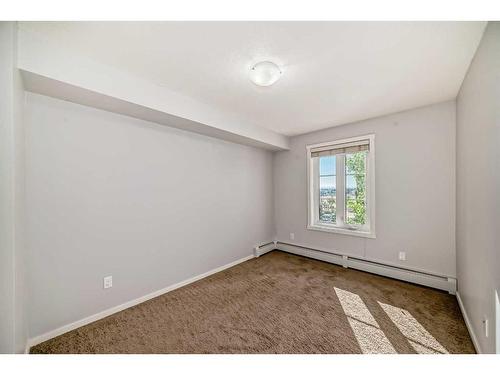 1316-99 Copperstone Park Se, Calgary, AB - Indoor Photo Showing Other Room