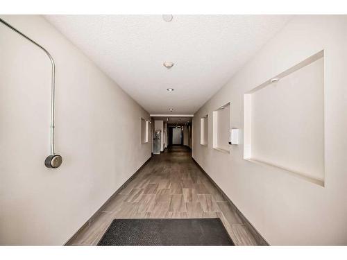 1316-99 Copperstone Park Se, Calgary, AB - Indoor Photo Showing Other Room