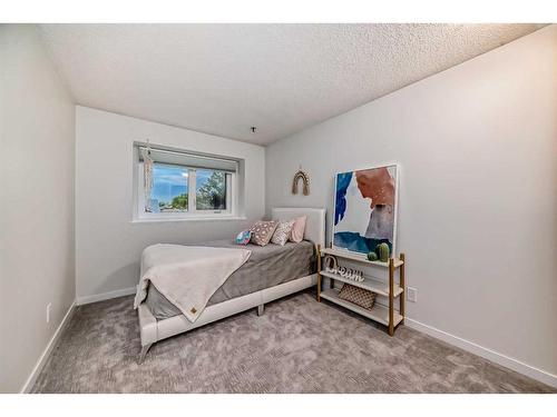 111 Sunmills Place Se, Calgary, AB - Indoor Photo Showing Bedroom