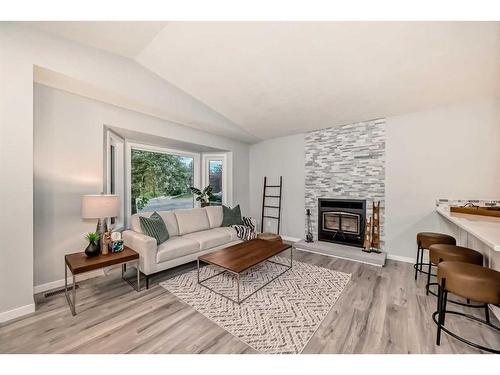 111 Sunmills Place Se, Calgary, AB - Indoor Photo Showing Living Room With Fireplace