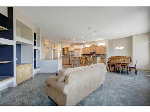 7823 Springbank Way Sw, Calgary, AB - Indoor Photo Showing Living Room