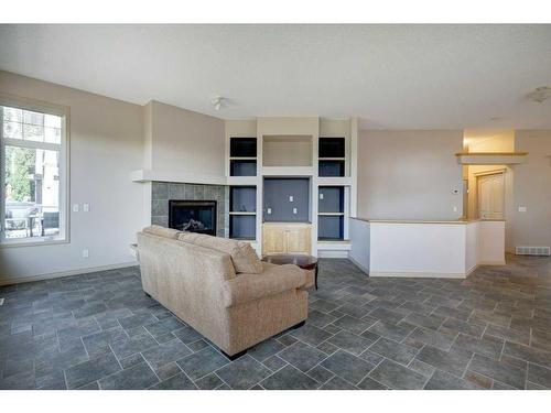 7823 Springbank Way Sw, Calgary, AB - Indoor With Fireplace