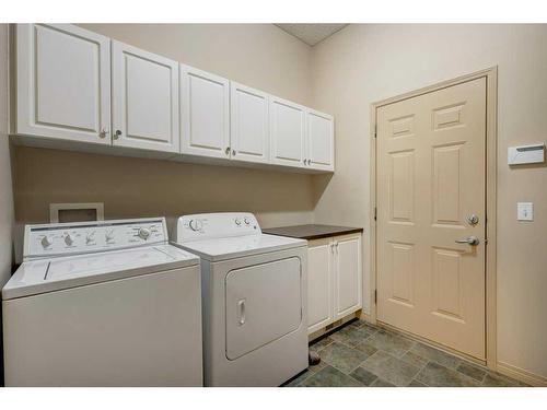 7823 Springbank Way Sw, Calgary, AB - Indoor Photo Showing Laundry Room