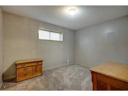 7823 Springbank Way Sw, Calgary, AB - Indoor Photo Showing Other Room