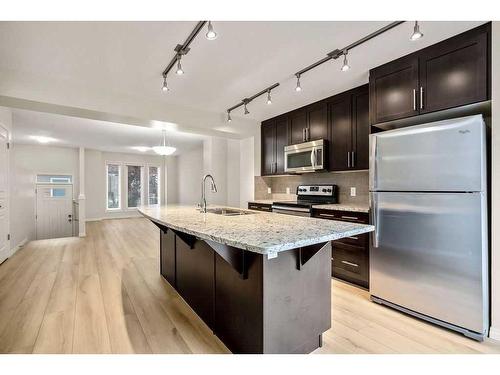 707 Auburn Bay Square Se, Calgary, AB - Indoor Photo Showing Kitchen With Stainless Steel Kitchen With Upgraded Kitchen