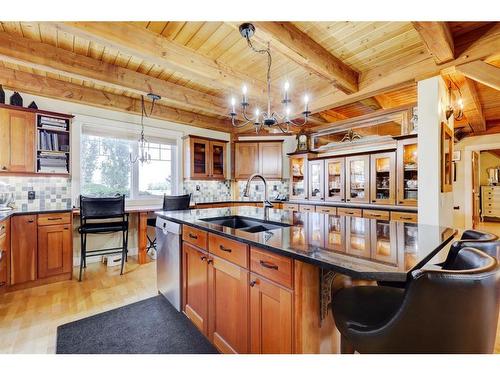 2407 Hwy 582, Didsbury, AB - Indoor Photo Showing Kitchen With Double Sink