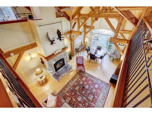 2407 Hwy 582, Didsbury, AB - Indoor With Fireplace