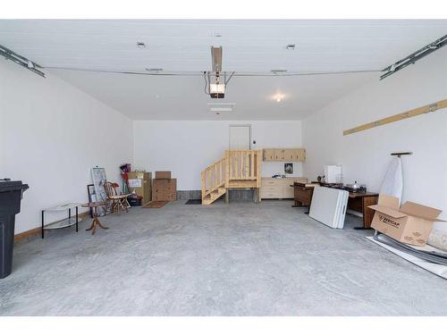 20 Stone Garden Crescent, Carstairs, AB - Indoor Photo Showing Garage