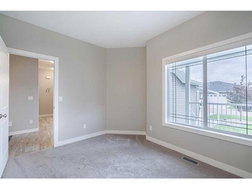 20 Stone Garden Crescent, Carstairs, AB - Indoor Photo Showing Other Room