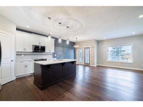 20 Stone Garden Crescent, Carstairs, AB - Indoor Photo Showing Kitchen With Upgraded Kitchen