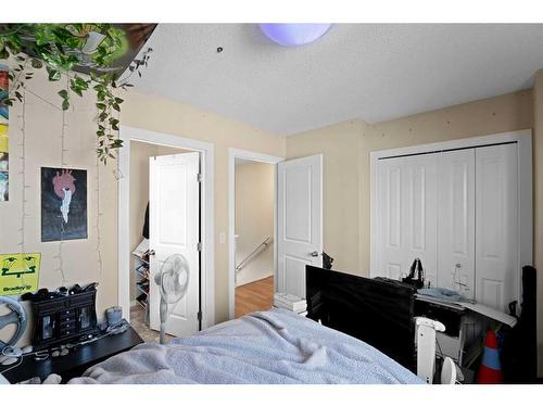 174 New Brighton Point Se, Calgary, AB - Indoor Photo Showing Bedroom