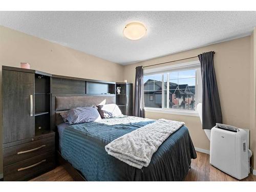 174 New Brighton Point Se, Calgary, AB - Indoor Photo Showing Bedroom