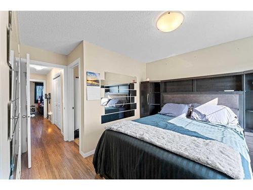 174 New Brighton Point Se, Calgary, AB - Indoor Photo Showing Bedroom