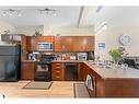 174 New Brighton Point Se, Calgary, AB  - Indoor Photo Showing Kitchen With Double Sink 