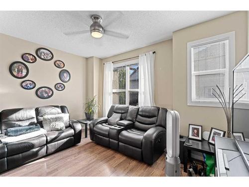 174 New Brighton Point Se, Calgary, AB - Indoor Photo Showing Living Room