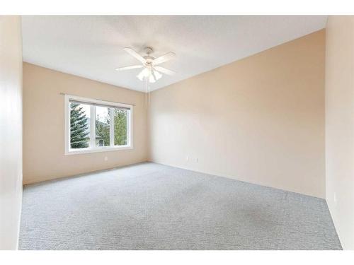 95-72 Millside Drive Sw, Calgary, AB - Indoor Photo Showing Other Room