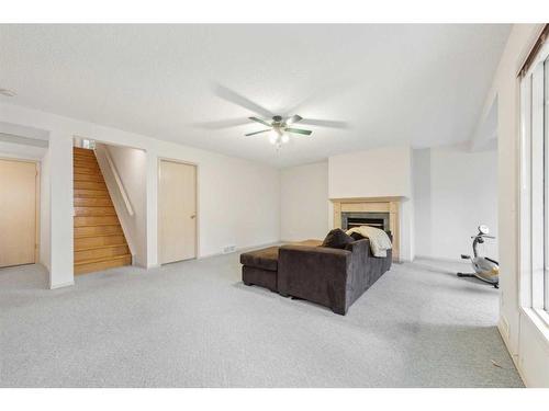 95-72 Millside Drive Sw, Calgary, AB - Indoor With Fireplace