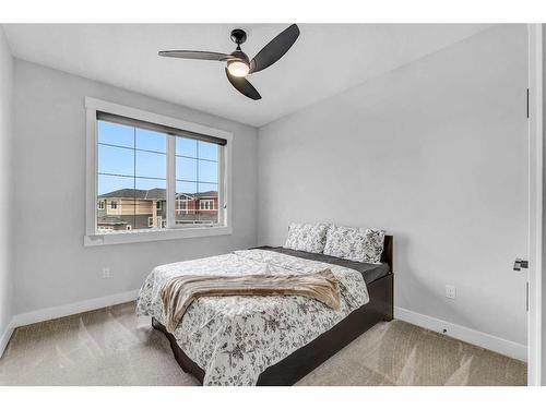 26 Chelsea Bay, Chestermere, AB - Indoor Photo Showing Bedroom