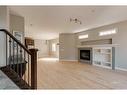 2-1617 27 Avenue Sw, Calgary, AB  - Indoor With Fireplace 