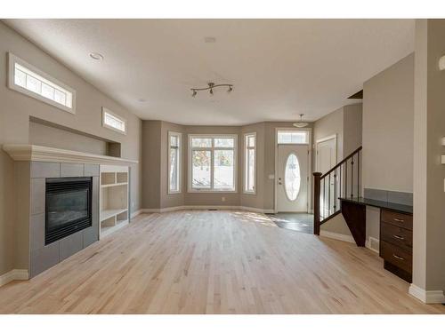 2-1617 27 Avenue Sw, Calgary, AB - Indoor Photo Showing Other Room With Fireplace