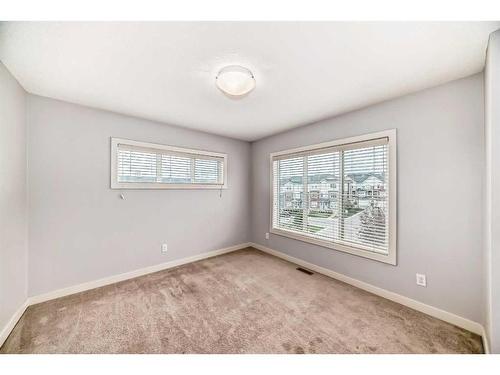 211-355 Nolancrest Heights Nw, Calgary, AB - Indoor Photo Showing Other Room