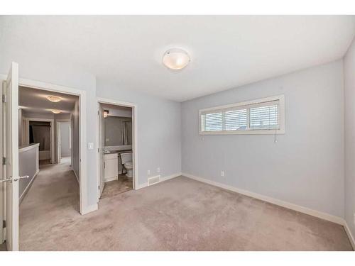 211-355 Nolancrest Heights Nw, Calgary, AB - Indoor Photo Showing Other Room