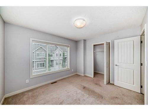 211-355 Nolancrest Heights Nw, Calgary, AB - Indoor Photo Showing Other Room