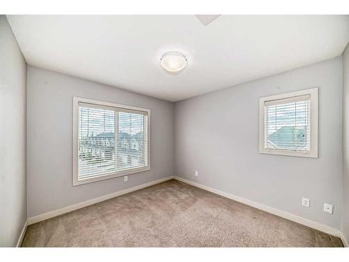 211-355 Nolancrest Heights Nw, Calgary, AB - Indoor Photo Showing Other Room