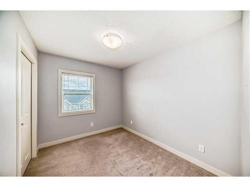 211-355 Nolancrest Heights Nw, Calgary, AB - Indoor Photo Showing Other Room